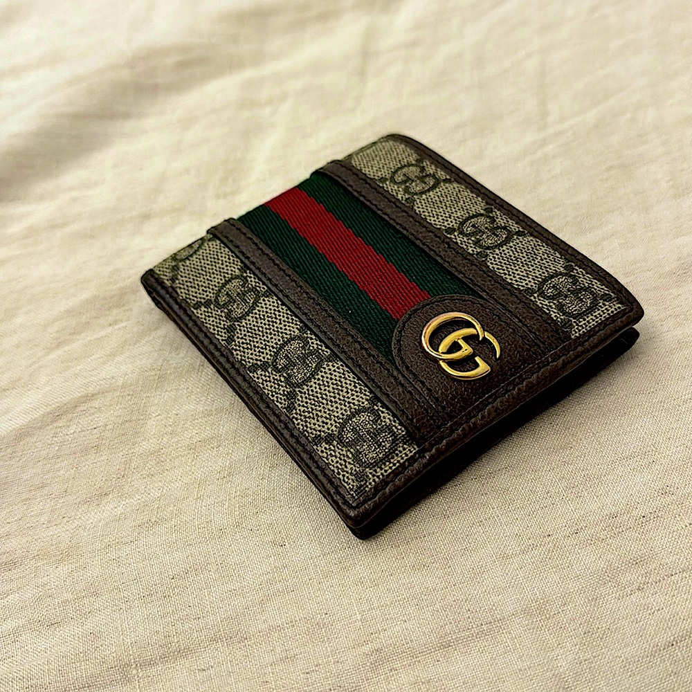 Men’s Gucci wallet. About a year old and lightly used.